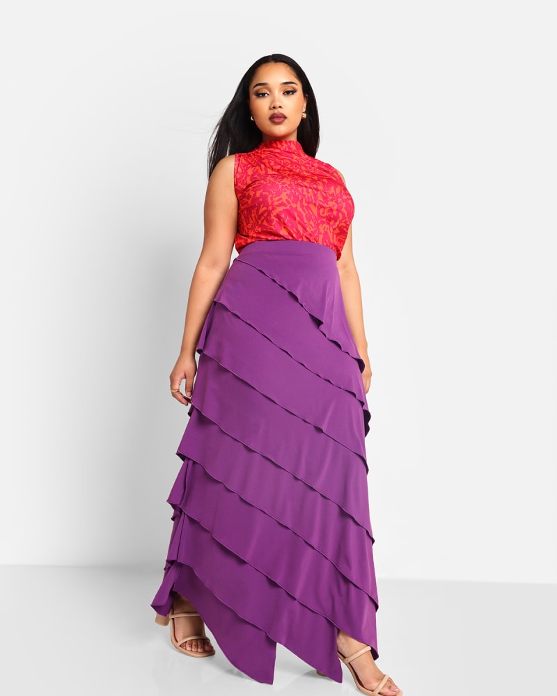 Front of a model wearing a size 3x Rebdolls Women's Aria Ruffle Maxi Bodycon Skirt in Purple by Rebdolls. | dia_product_style_image_id:327781